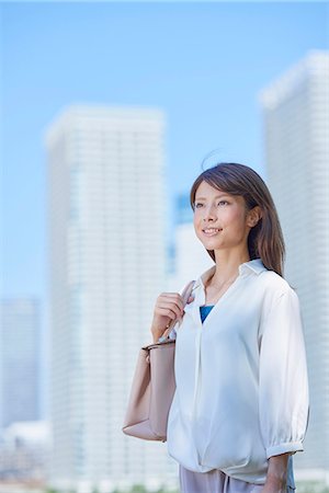 simsearch:622-09014015,k - Portrait of young Japanese woman downtown Tokyo, Japan Stock Photo - Premium Royalty-Free, Code: 622-09013962