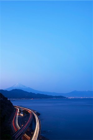 Night view of Mount Fuji and highway from Satta ridge at sunset, Shizuoka Prefecture, Japan Stock Photo - Premium Royalty-Free, Code: 622-09025308