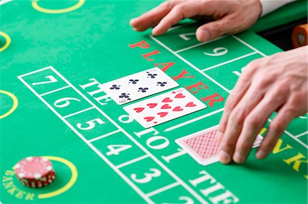 Black Jack dealer at casino Fotografie stock - Premium Royalty-Free, Codice: 622-09056236