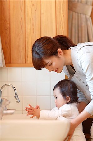 Teacher with kid at Japanese kindergarten Stock Photo - Premium Royalty-Free, Code: 622-09056269