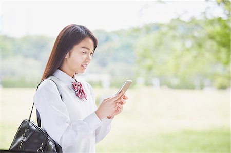 pic japanese young girls 18 - Cute Japanese high school student in a city park Stock Photo - Premium Royalty-Free, Code: 622-09138596