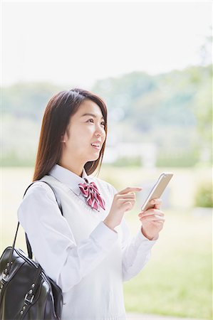 pic japanese young girls 18 - Cute Japanese high school student in a city park Stock Photo - Premium Royalty-Free, Code: 622-09138598
