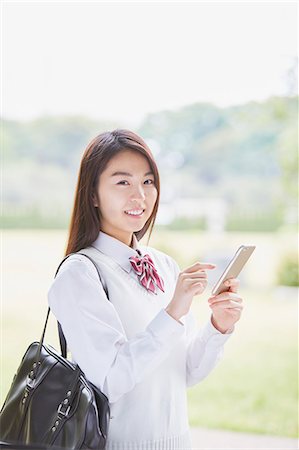 pic japanese young girls 18 - Cute Japanese high school student in a city park Stock Photo - Premium Royalty-Free, Code: 622-09138599