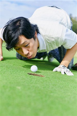 freizeitsportarten - Japanese golf player on course Stockbilder - Premium RF Lizenzfrei, Bildnummer: 622-09148386