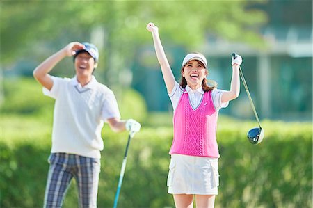 Japanese golf players on course Fotografie stock - Premium Royalty-Free, Codice: 622-09148398