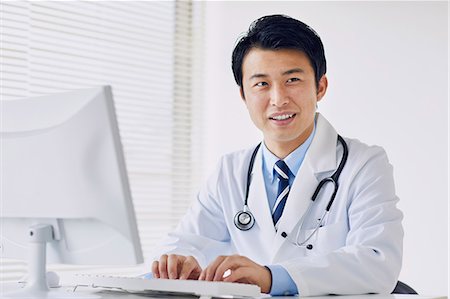 sincere - Japanese doctor in his studio Stock Photo - Premium Royalty-Free, Code: 622-09169659