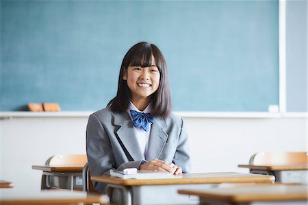 Mixed-race student in the classroom Stock Photo - Premium Royalty-Free, Code: 622-09169911
