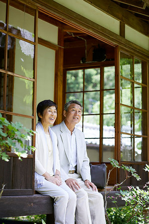 Japanese senior couple having fun at traditional inn Stock Photo - Premium Royalty-Free, Code: 622-09176148