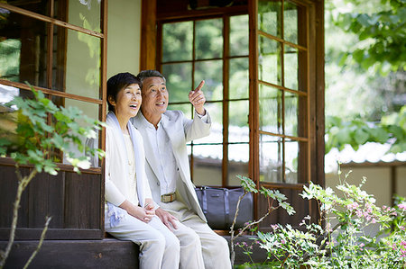 Japanese senior couple having fun at traditional inn Stock Photo - Premium Royalty-Free, Code: 622-09176149