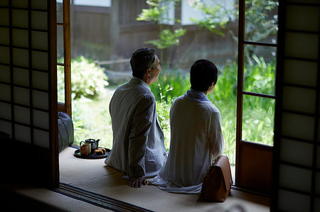Japanese senior couple having fun at traditional inn Stock Photo - Premium Royalty-Free, Code: 622-09176163