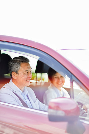 Japanese senior couple driving Stock Photo - Premium Royalty-Free, Code: 622-09176225