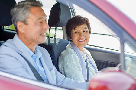 Japanese senior couple driving Stock Photo - Premium Royalty-Free, Code: 622-09176226