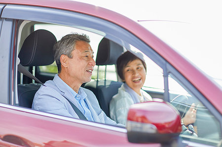 Japanese senior couple driving Stock Photo - Premium Royalty-Free, Code: 622-09176227