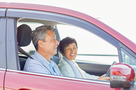 Japanese senior couple driving Stock Photo - Premium Royalty-Free, Code: 622-09176223