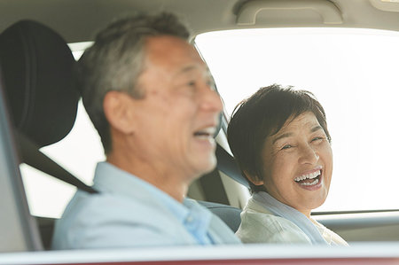 Japanese senior couple driving Stock Photo - Premium Royalty-Free, Code: 622-09176400