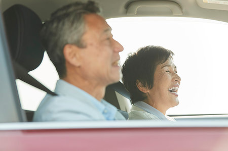 Japanese senior couple driving Stock Photo - Premium Royalty-Free, Code: 622-09176401