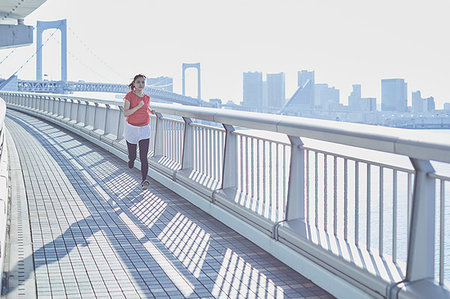 skewed - Young Japanese woman training downtown Tokyo Stock Photo - Premium Royalty-Free, Code: 622-09176458