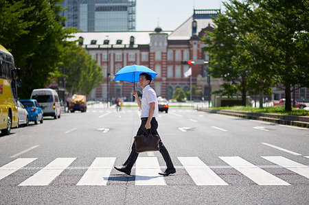 Japanese man with parasol Stock Photo - Premium Royalty-Free, Code: 622-09187207