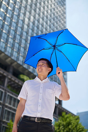 Japanese man with parasol Foto de stock - Sin royalties Premium, Código: 622-09187216