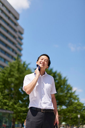 suit sweat - Japanese man in the hot weather Stock Photo - Premium Royalty-Free, Code: 622-09187212