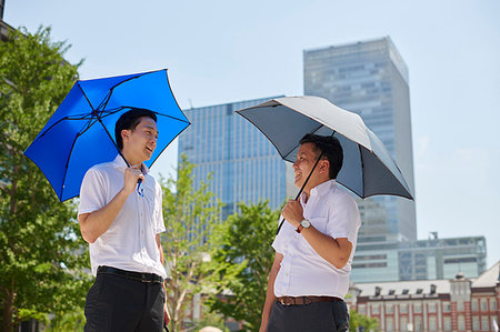 Japanese men with parasol Stock Photo - Premium Royalty-Free, Code: 622-09187220