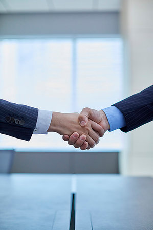 Japanese businesspeople shaking hands Stock Photo - Premium Royalty-Free, Code: 622-09180854
