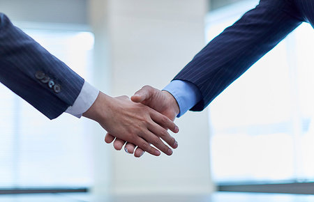 Japanese businesspeople shaking hands Stock Photo - Premium Royalty-Free, Code: 622-09180856