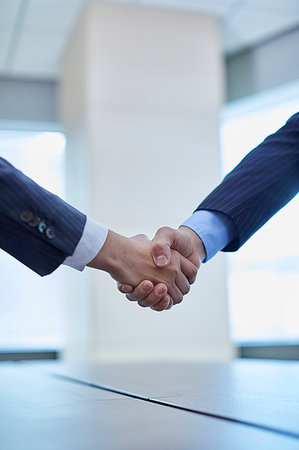 Japanese businesspeople shaking hands Stock Photo - Premium Royalty-Free, Code: 622-09180858