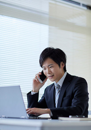 simsearch:622-09181045,k - Japanese businessman in the office Foto de stock - Royalty Free Premium, Número: 622-09181038