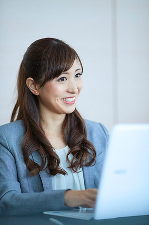 suit business people meeting laptop ethnic - Japanese businesswoman in the office Stock Photo - Premium Royalty-Free, Code: 622-09181119