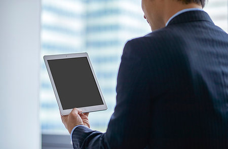 Japanese businessman in the office Stock Photo - Premium Royalty-Free, Code: 622-09181110