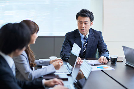 suit business people meeting laptop ethnic - Japanese businesspeople in a meeting Stock Photo - Premium Royalty-Free, Code: 622-09181139