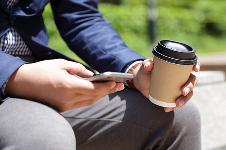 Japanese businessman with coffee Foto de stock - Sin royalties Premium, Código: 622-09194948