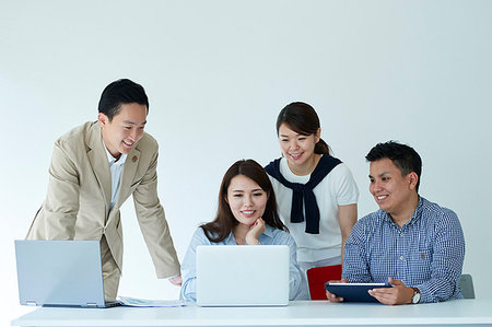Japanese business people at work Stock Photo - Premium Royalty-Free, Code: 622-09195208