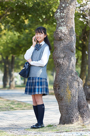 Japanese junior-high schoolgirl in uniform Stock Photo - Premium Royalty-Free, Code: 622-09195414