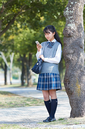 Japanese junior-high schoolgirl in uniform Stock Photo - Premium Royalty-Free, Code: 622-09195411