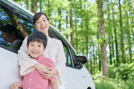 Japanese family in a city park Stock Photo - Premium Royalty-Free, Code: 622-09235715