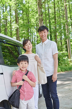 Japanese family in a city park Stock Photo - Premium Royalty-Free, Code: 622-09235717