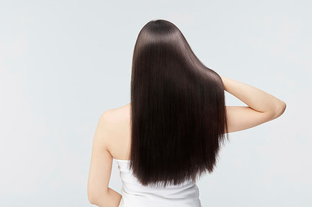 straight hair rearview - Young Japanese model with beautiful hair Stock Photo - Premium Royalty-Free, Code: 622-09235985