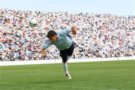 diving (not water) - Soccer player heading ball Foto de stock - Sin royalties Premium, Código: 622-00701456