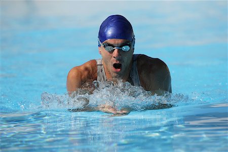 professional swimmer - Male Swimmer Swimming Butterfly Stock Photo - Premium Royalty-Free, Code: 622-00806874