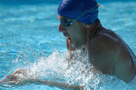 professional swimmer - Male Swimmer Swimming Butterfly Stock Photo - Premium Royalty-Free, Code: 622-00806875