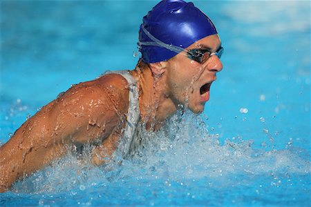 Male Swimmer Swimming Butterfly Stock Photo - Premium Royalty-Free, Code: 622-00806876