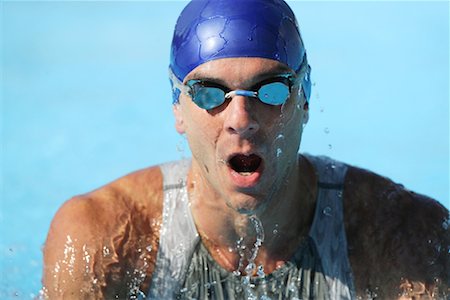 professional swimmer - Male Swimmer Swimming Butterfly Stock Photo - Premium Royalty-Free, Code: 622-00806873