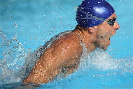 professional swimmer - Male Swimmer Swimming Butterfly Stock Photo - Premium Royalty-Free, Code: 622-00806885