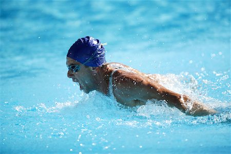 professional swimmer - Male Swimmer Swimming Butterfly Stock Photo - Premium Royalty-Free, Code: 622-00806895