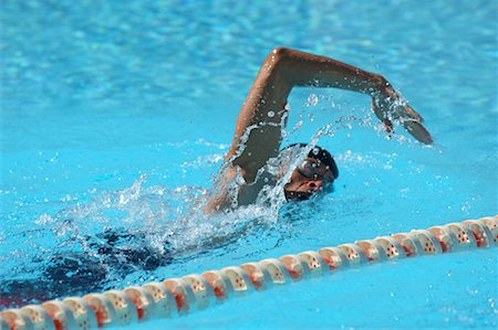 professional swimmer - Female Swimmer Swimming Crawl Stock Photo - Premium Royalty-Free, Code: 622-00806901