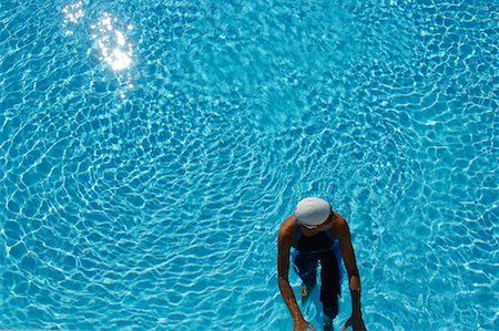 professional swimmer - Bird's Eye View of Female Swimmer In Pool Stock Photo - Premium Royalty-Free, Code: 622-00806932