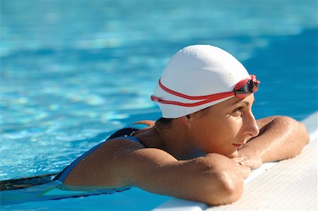 professional swimmer - Female Swimmer Leaning on Poolside Stock Photo - Premium Royalty-Free, Code: 622-00806944