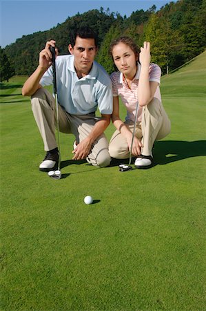 Smiling couple on the green Stock Photo - Premium Royalty-Free, Code: 622-00807100